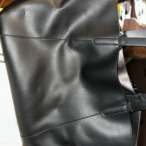 Black medium sized tote with coin purse. Never used.